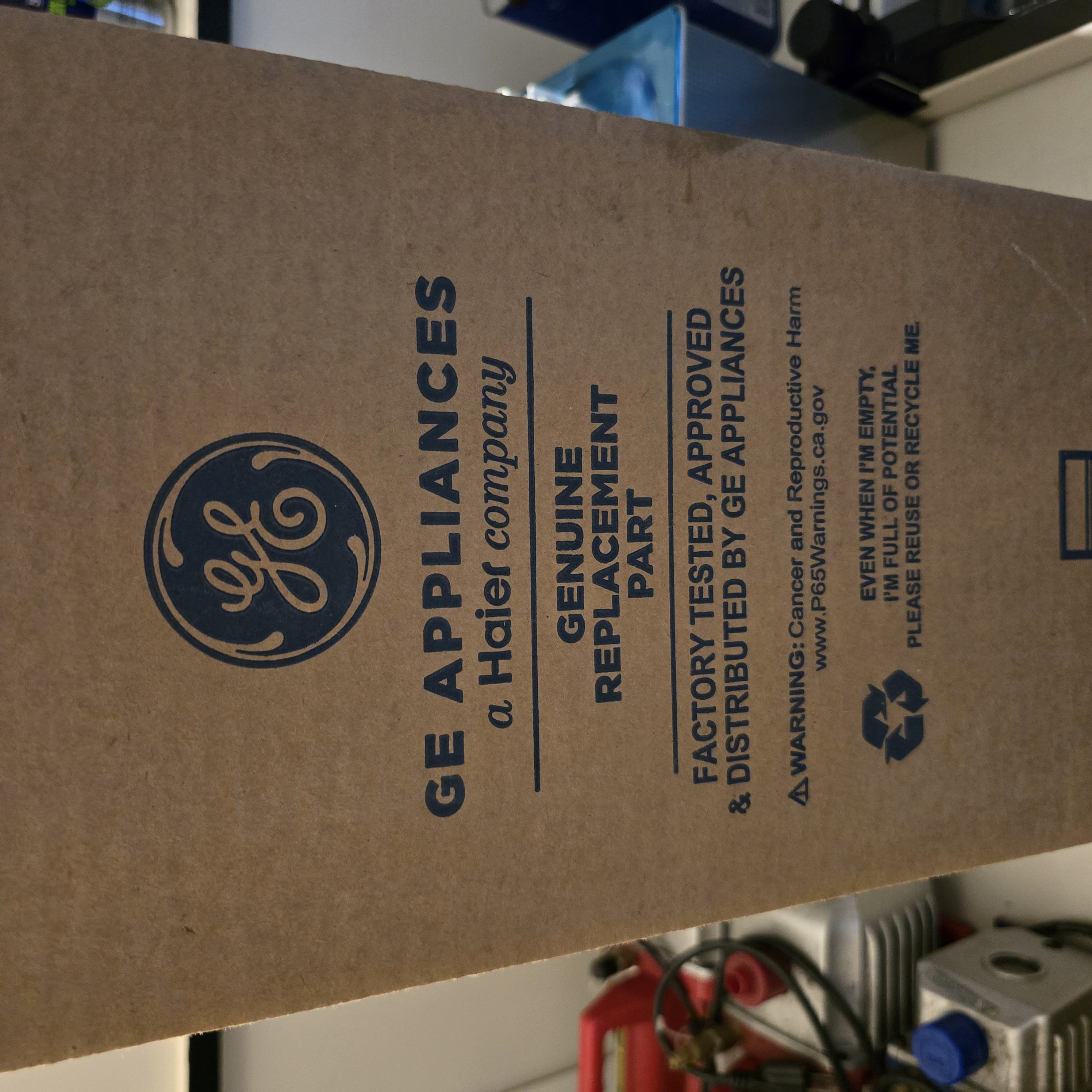 New, OEM. GE Control Fascia with Knob. WH10X33957